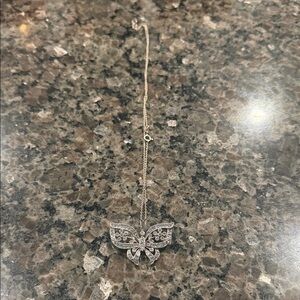 Delicate Butterfly Pendant Necklace in Silver